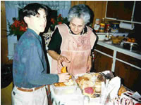 Sean White helping Grandma in the kitchen
	